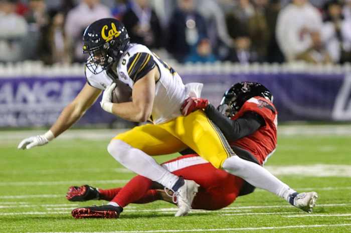 Texas Tech safety Dadrion Taylor-Demerson (right) tackles California tight end Jack Endries (left) during the 47th Radience Technology Independence Bowl Saturday evening, December 16, 2023, in Shreveport, La.
